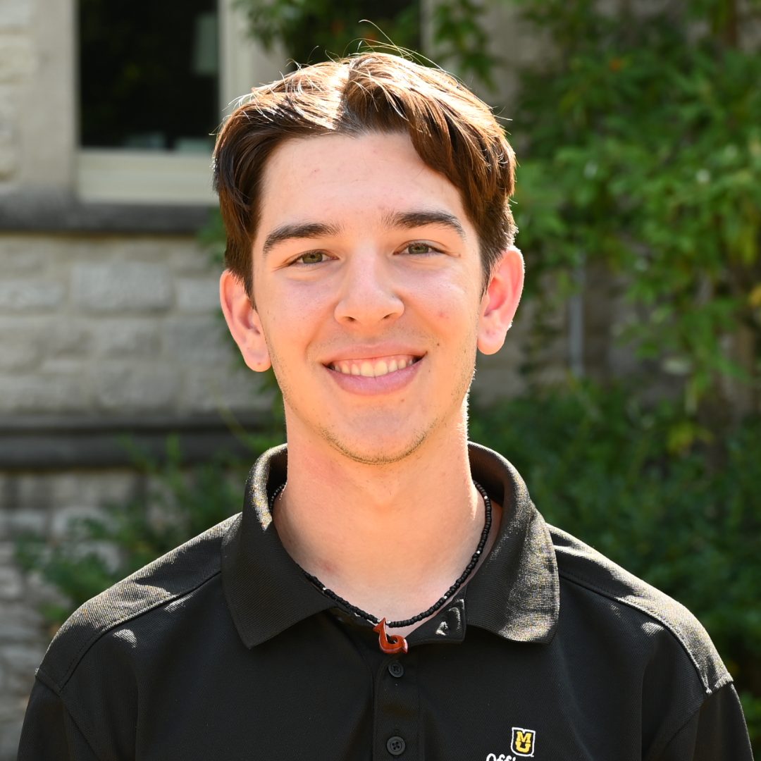 Professional headshot of Logan Garcia