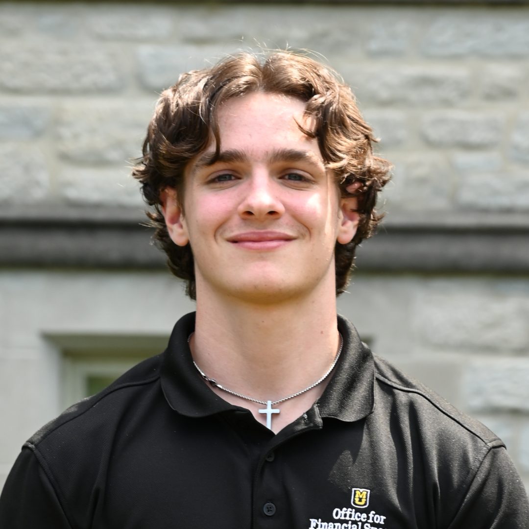 Professional headhsot of Tristan Stokes